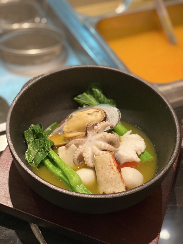 The hot and sour seafood soup is a favorite dish for diners. A customizable addition to Silk's dinner buffet.
